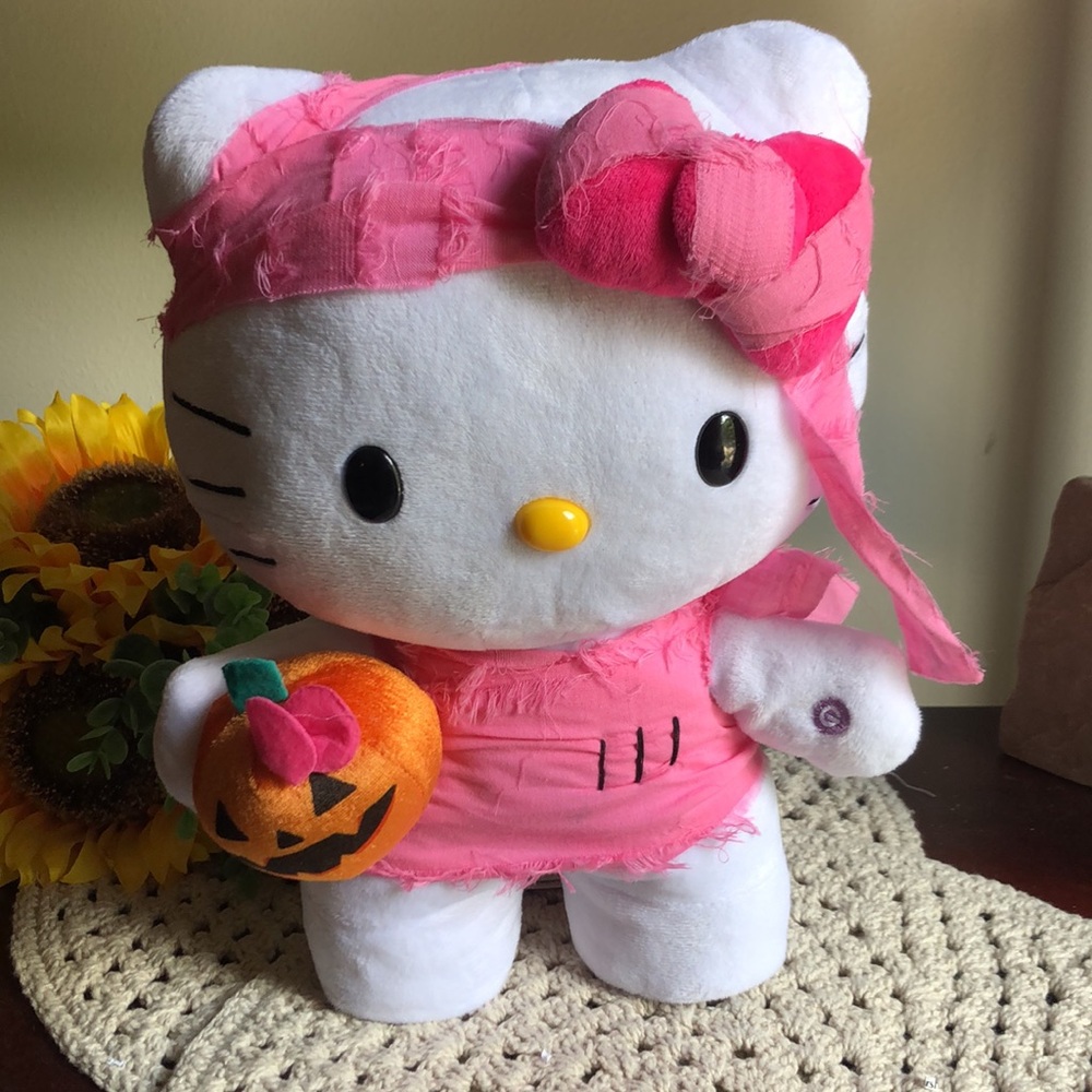 Pink and White Hello Kitty Halloween Plush with Pumpkin Side Stepper
